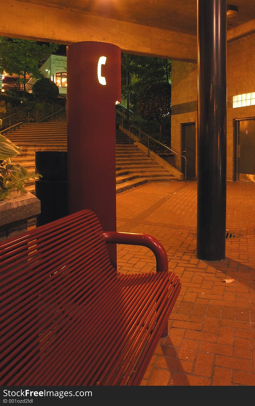 A funky public phone in an empty plaza on Commerce Street in downtown Tacoma, Washington. Taken late at night when no one was around. A funky public phone in an empty plaza on Commerce Street in downtown Tacoma, Washington. Taken late at night when no one was around.