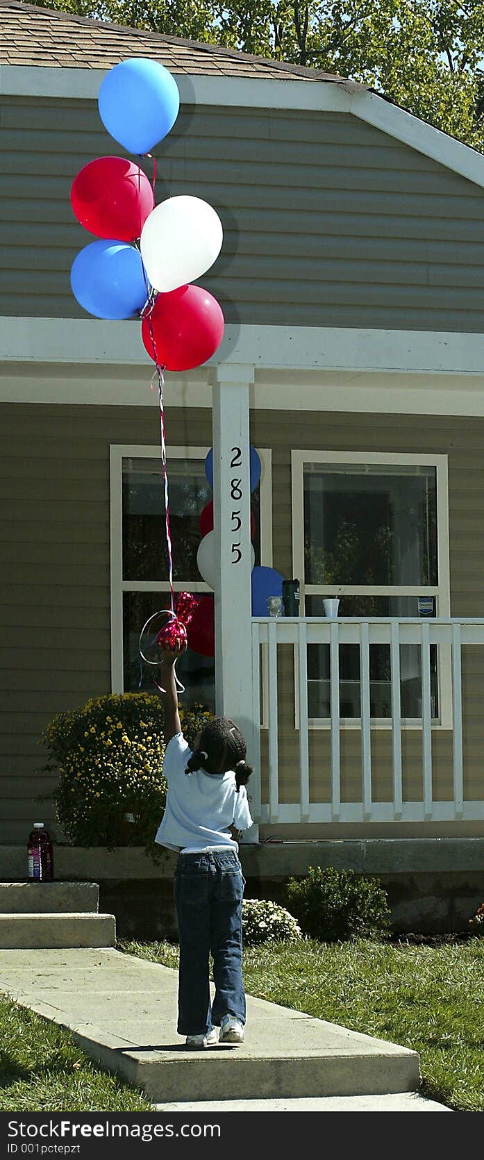 Child and Balloons