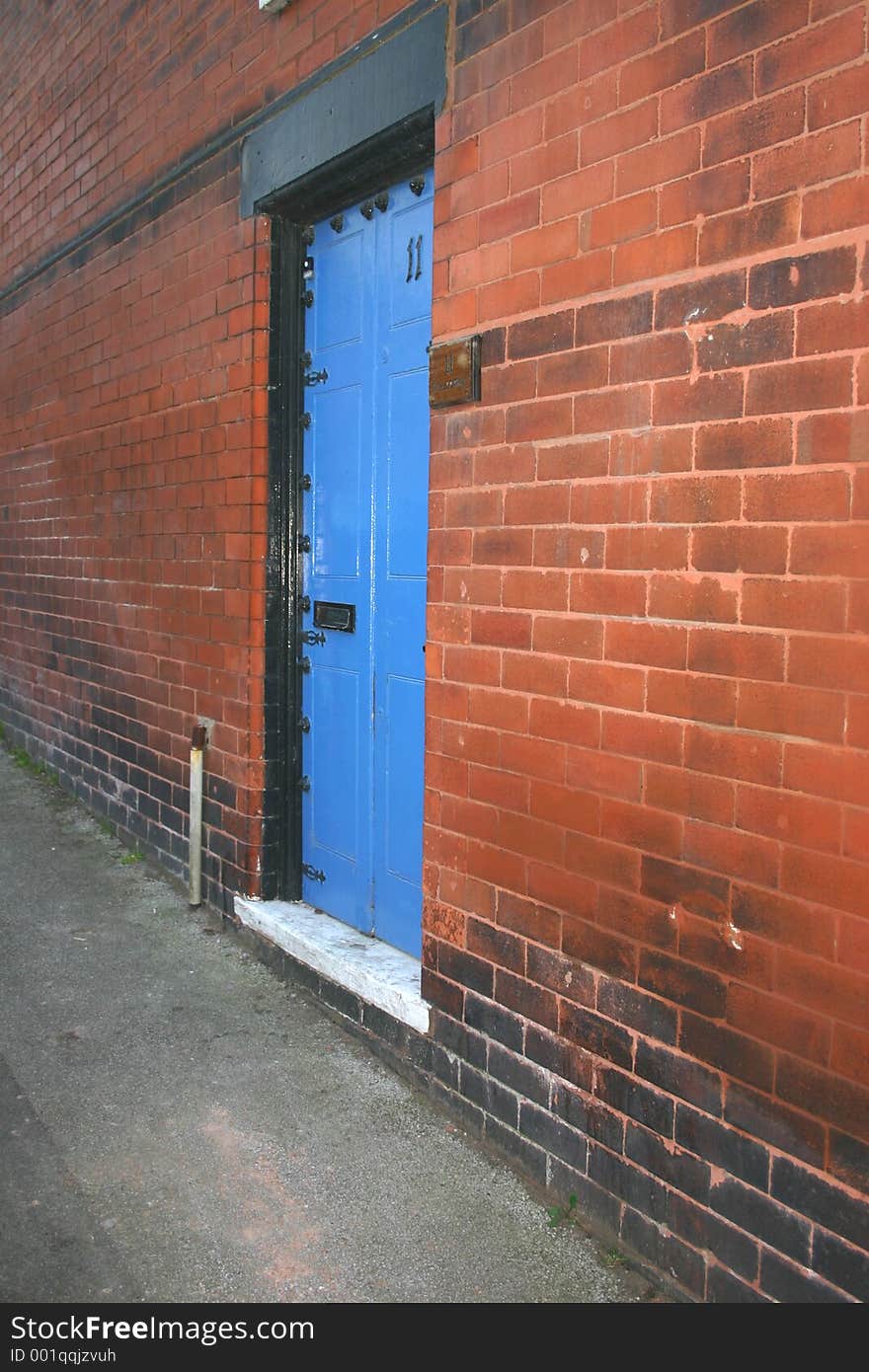 Blue Door in the Side of a House