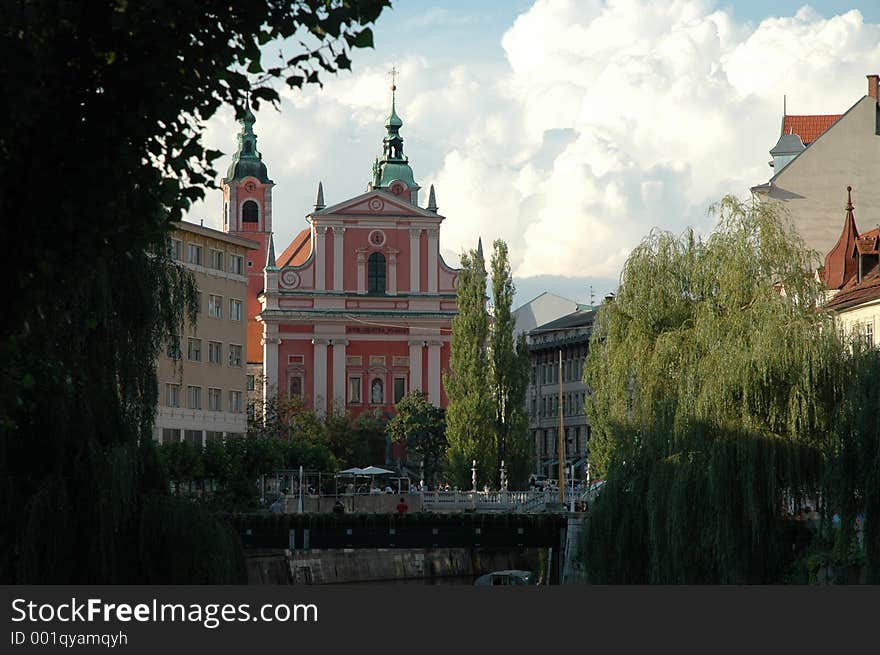 European church and willow trees. European church and willow trees