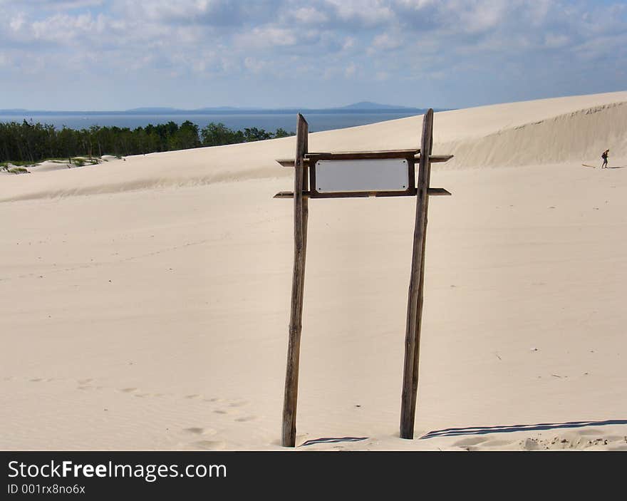 Empty desert sign post.