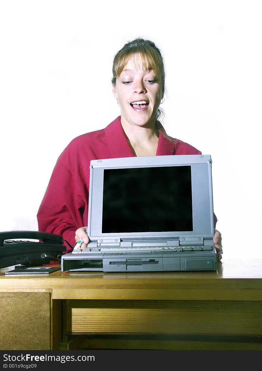 Woman Presenting With A Laptop