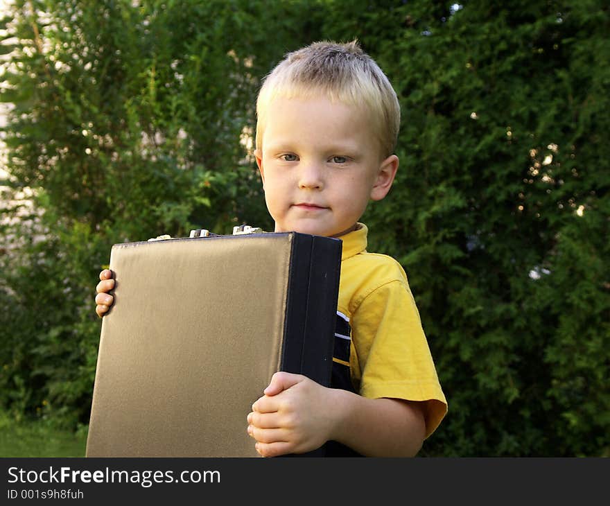 Boy and briefcase. Boy and briefcase