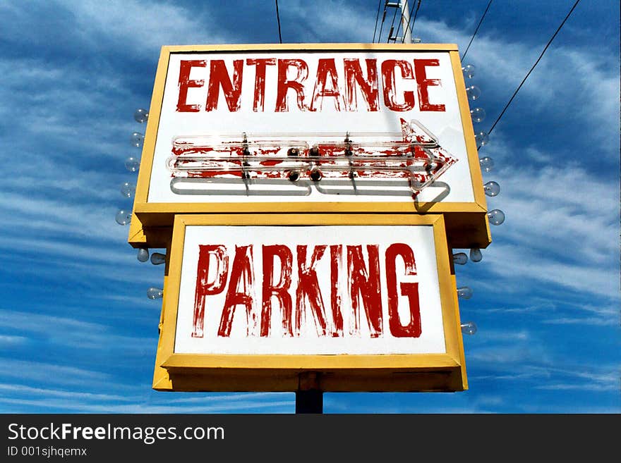 Weather-worn entrance/parking sign. Weather-worn entrance/parking sign