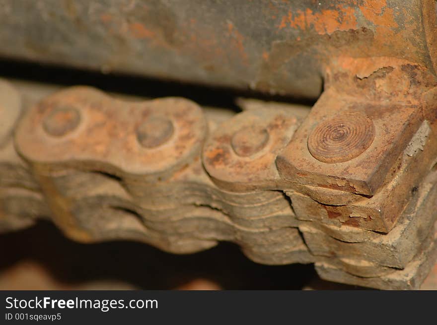 Rusty links of large chain drive ... construction