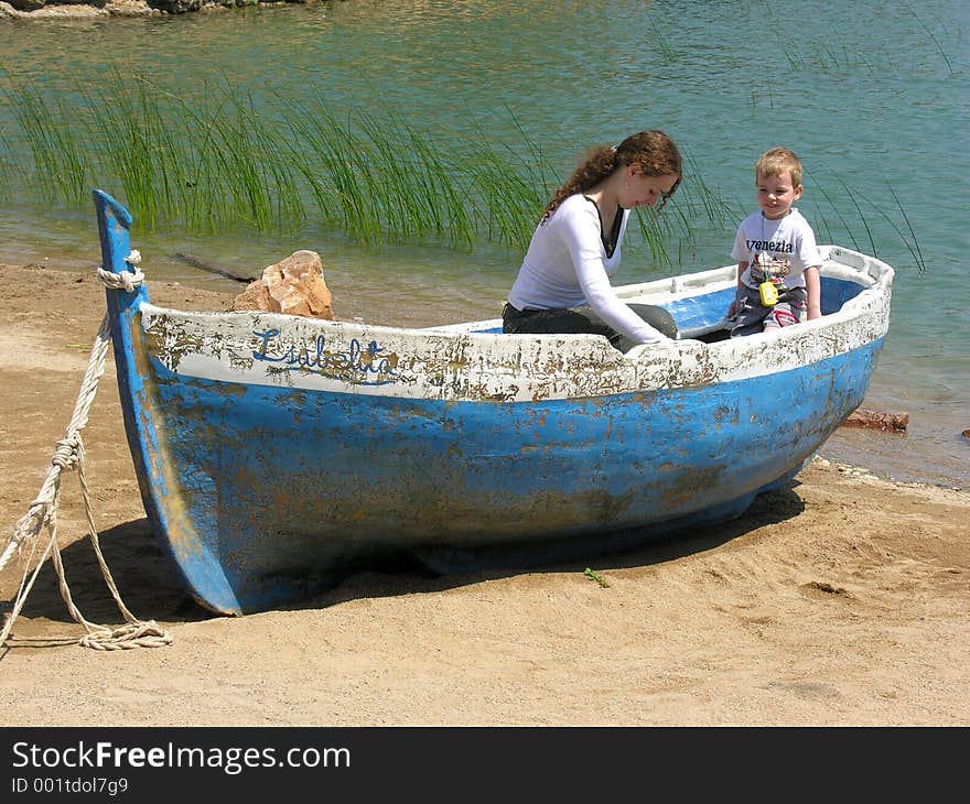 Mother with son on boat