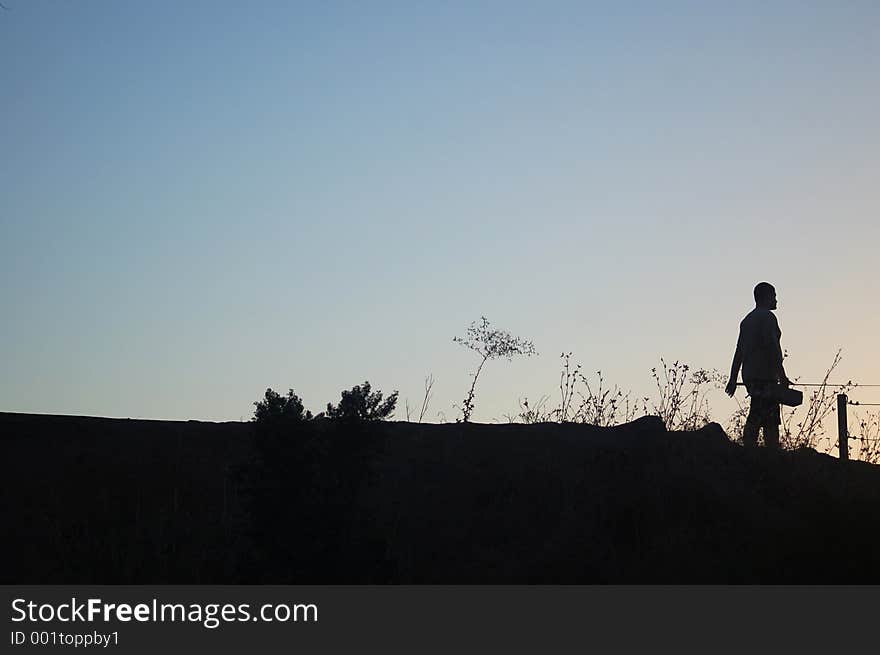 Silhouette of a fisherman