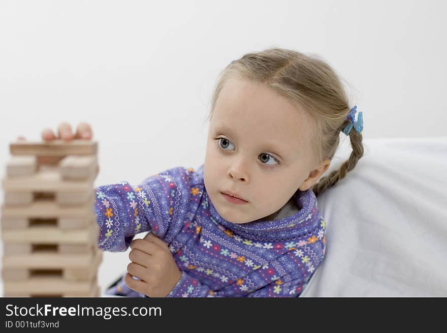 Girl playing. Focus on the face. Girl playing. Focus on the face.