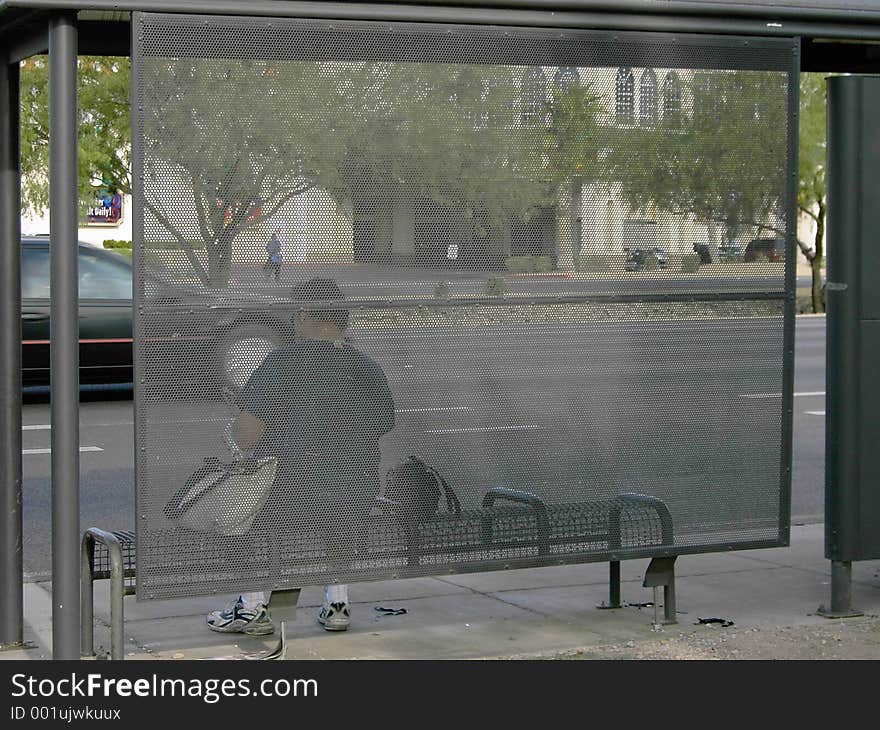 Waiting at the bus stop. Waiting at the bus stop