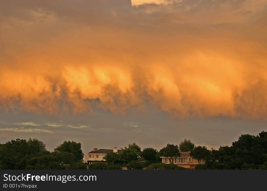 Smoke filled clouds billowing over hilltop overlooking LA Basin during fire at sunset. Smoke filled clouds billowing over hilltop overlooking LA Basin during fire at sunset