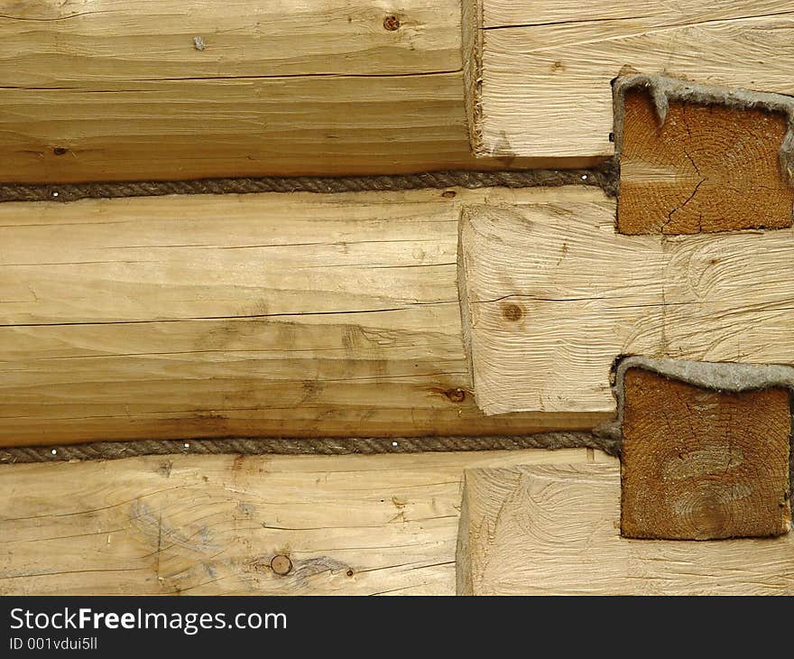 Fragment of the log house wall. Fragment of the log house wall