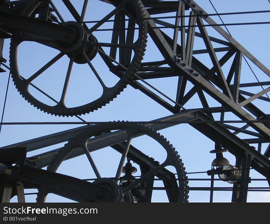 Power line and support structure above train tracks. Power line and support structure above train tracks