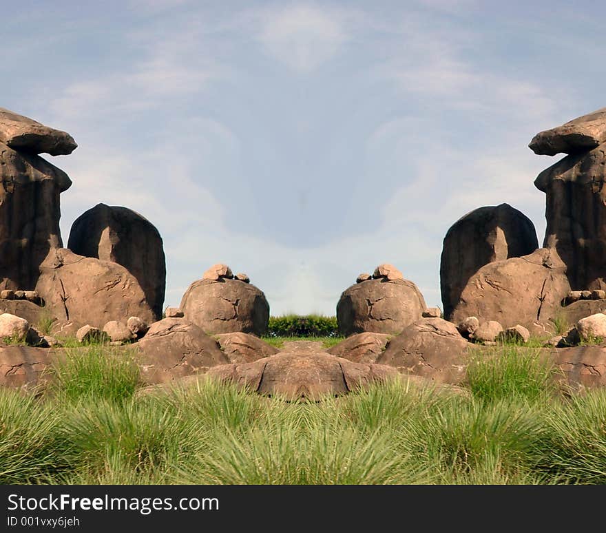 Symmetric rock formation made from a pillar of rocks into what could be seen as a pass of some sort. Symmetric rock formation made from a pillar of rocks into what could be seen as a pass of some sort