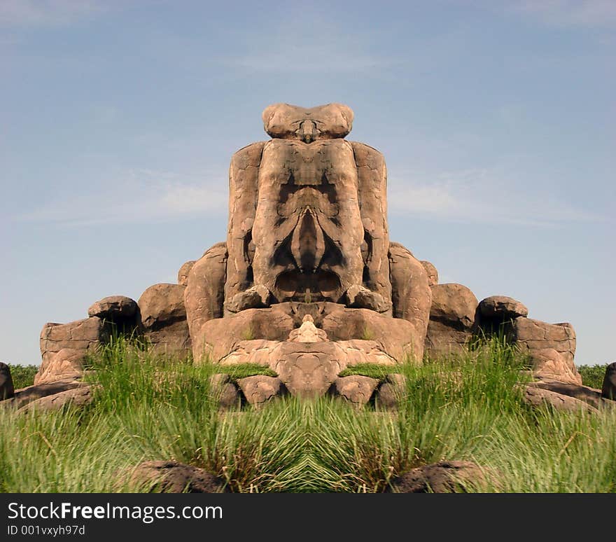 Symmetric rock formation made from a pillar of rocks into what could be seen as a pig's face. Symmetric rock formation made from a pillar of rocks into what could be seen as a pig's face