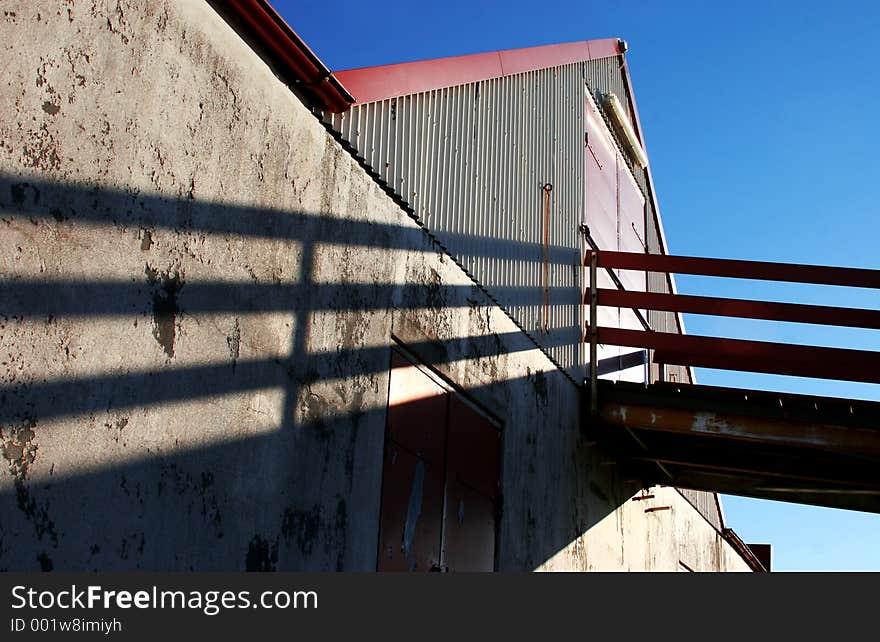 Barn on a sunny day with high contrast shadows