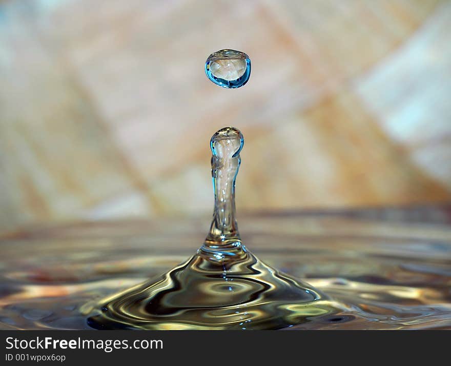 A single water drop in various color. A single water drop in various color