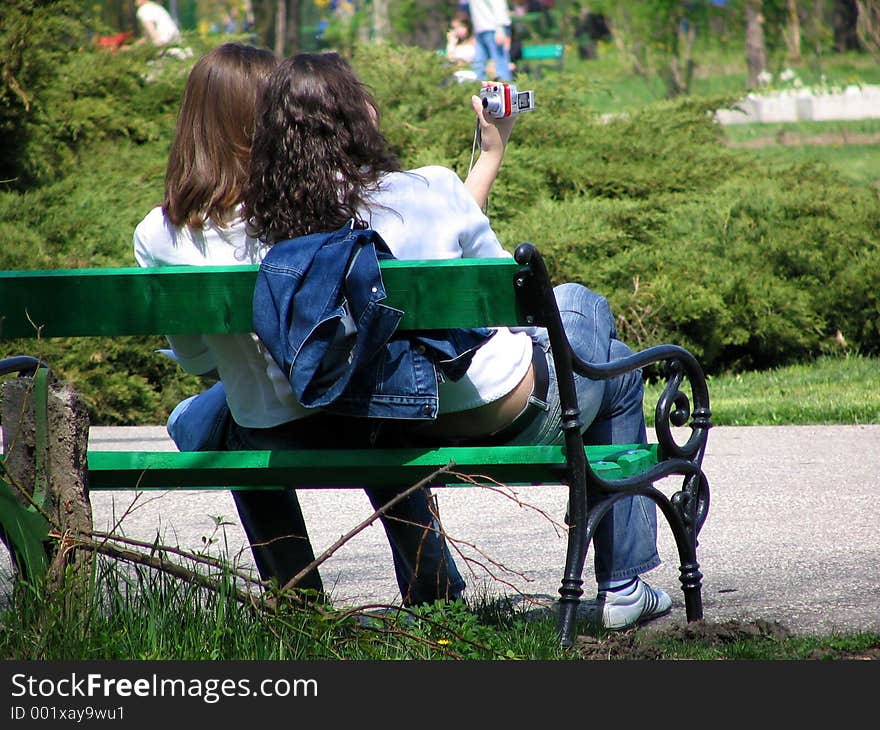 Two Girls On A Bench