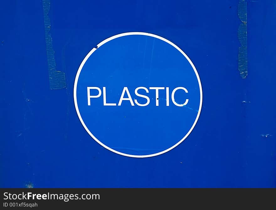 The lable on the side of a plastics recycling bin. The lable on the side of a plastics recycling bin