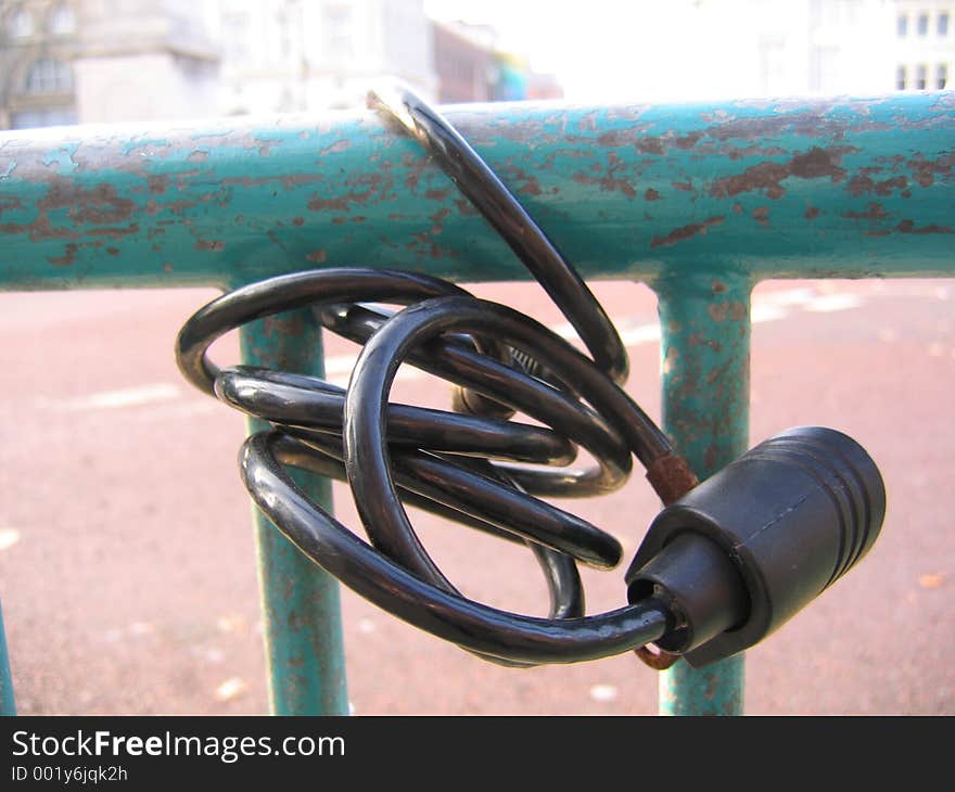 Bike Lock Abandoned on Railings. Bike Lock Abandoned on Railings