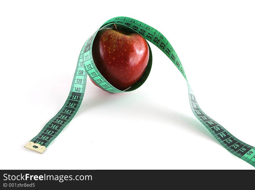 Red apple and tape isolated over a white background