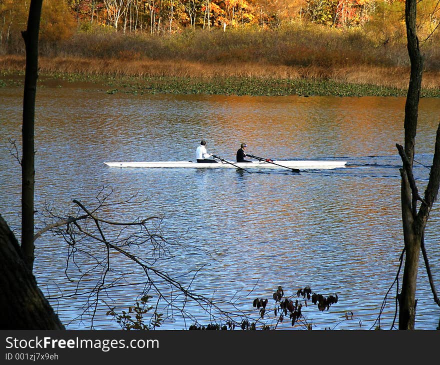 Two rowers in a skiff