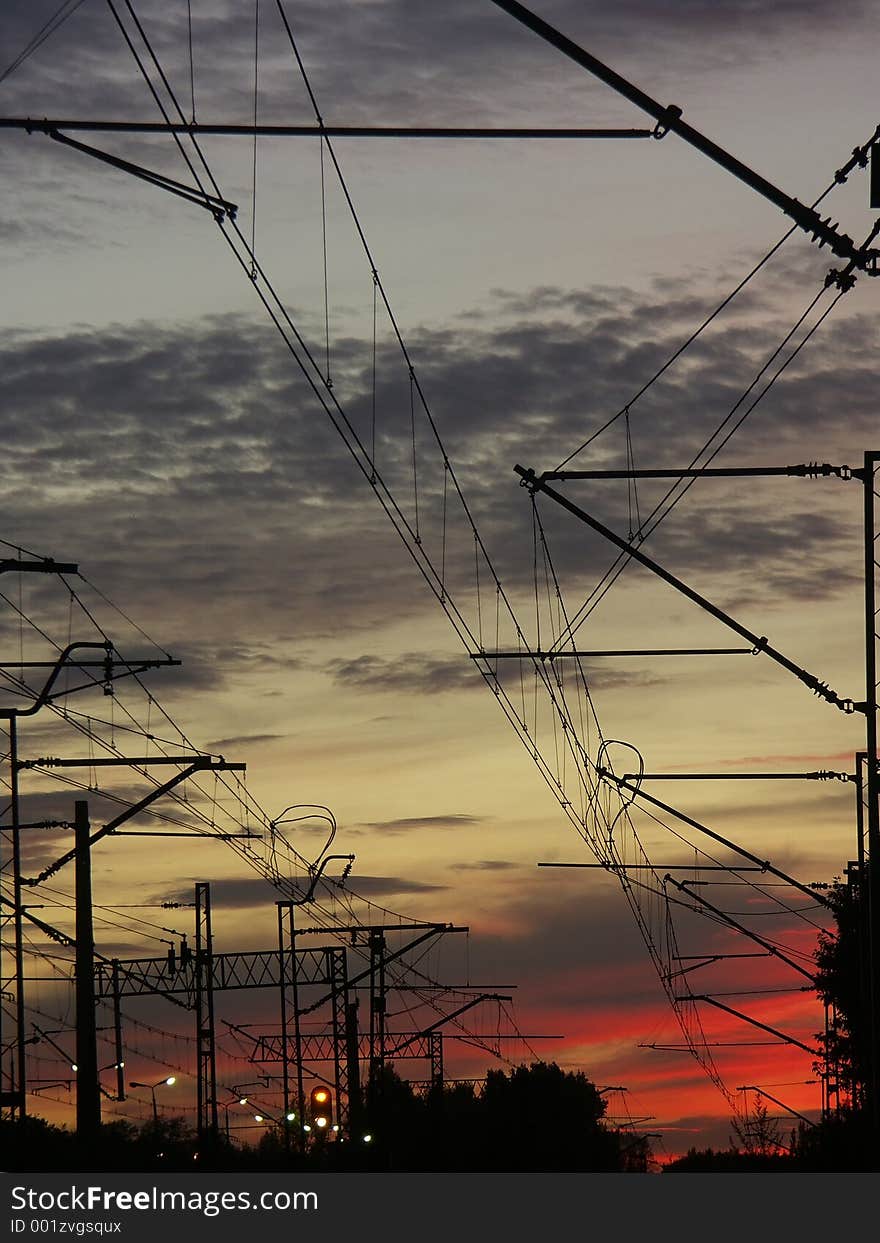 Railway infrastructure against the sunset sky. Railway infrastructure against the sunset sky