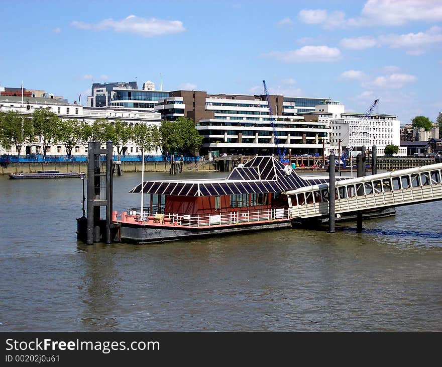 This is one of many piers in the River Thames in London. This is one of many piers in the River Thames in London.