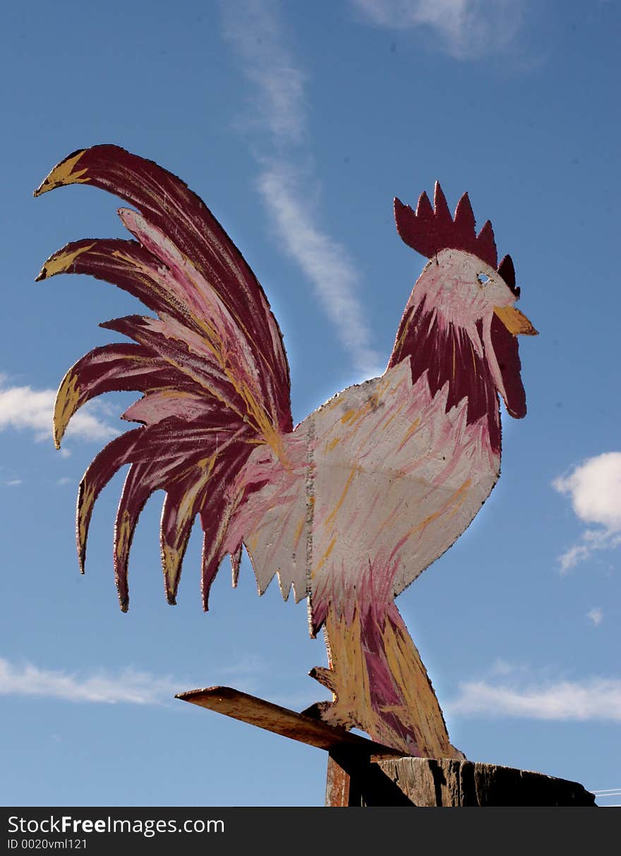 Giant Chicken Sign Backed By Blue Sky. Giant Chicken Sign Backed By Blue Sky