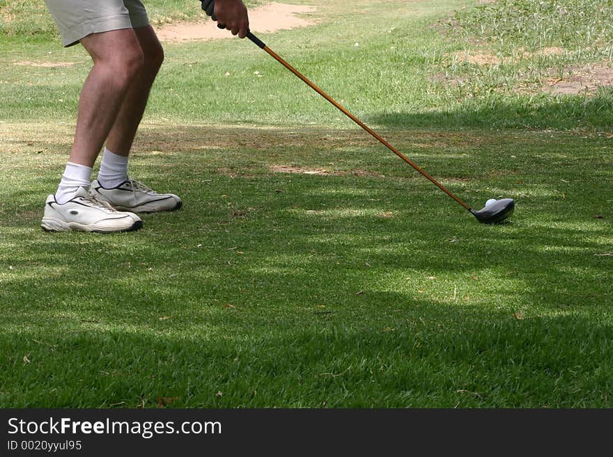 Golfer ready to tee-off