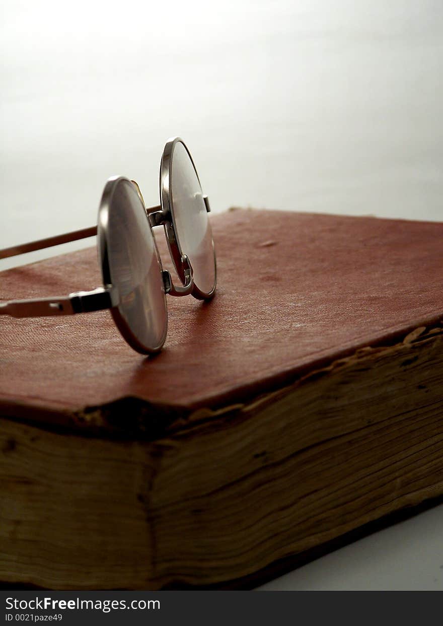 Glasses on book.