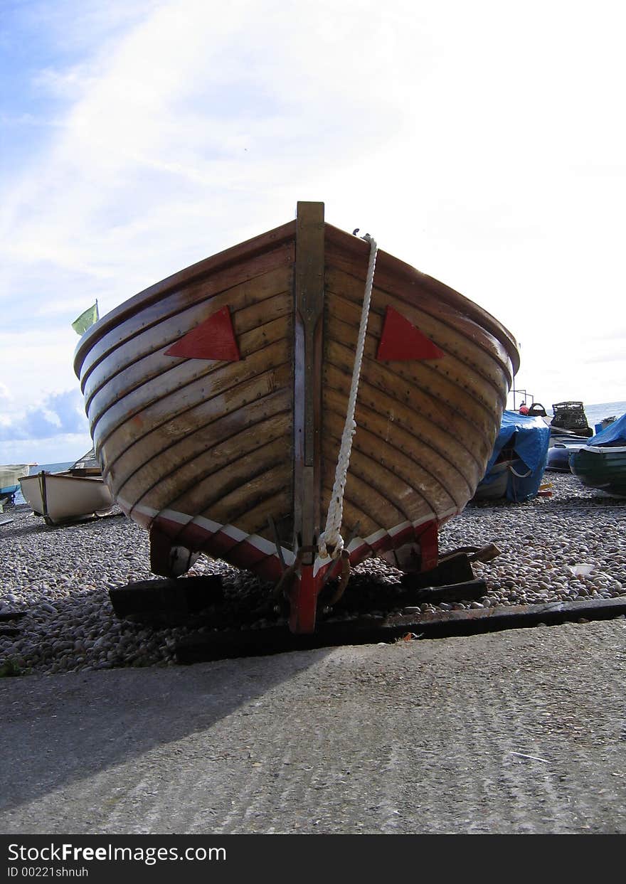 Bow of Wooden Motor Boat on a Beach in Devon. Bow of Wooden Motor Boat on a Beach in Devon