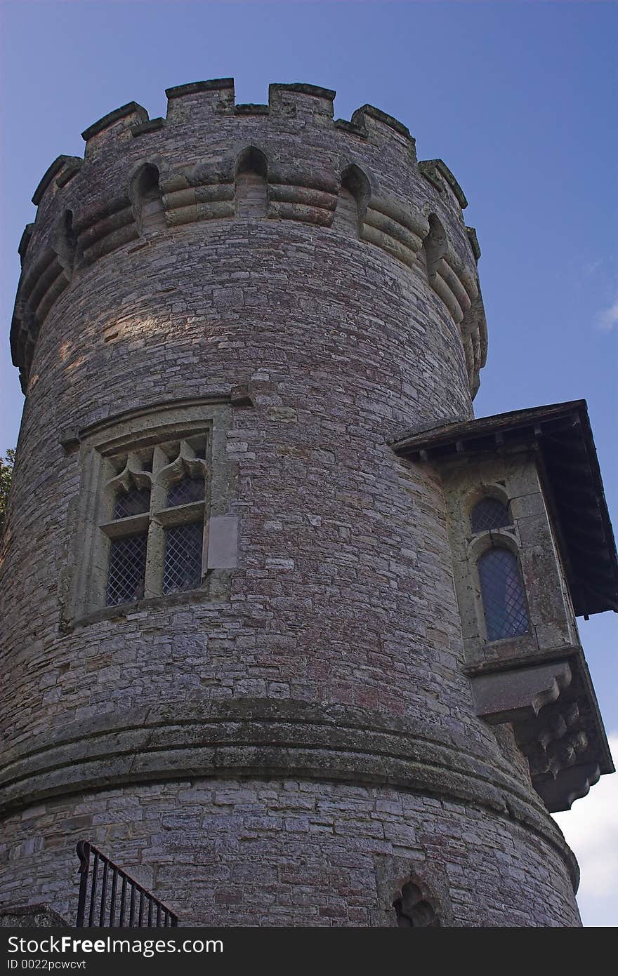 Old stone tower,looking up to deep blue sky. Old stone tower,looking up to deep blue sky