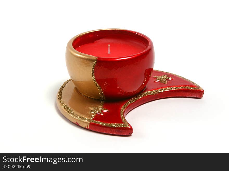 Red christmas candles on various christmas theme candleholders. Red christmas candles on various christmas theme candleholders.