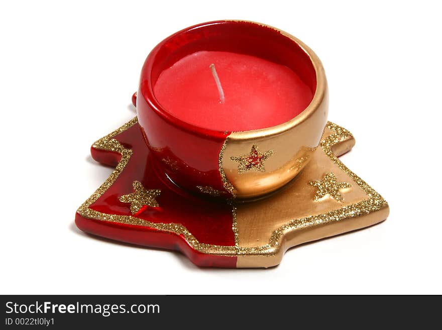 Red christmas candles on various christmas theme candleholders. Red christmas candles on various christmas theme candleholders.