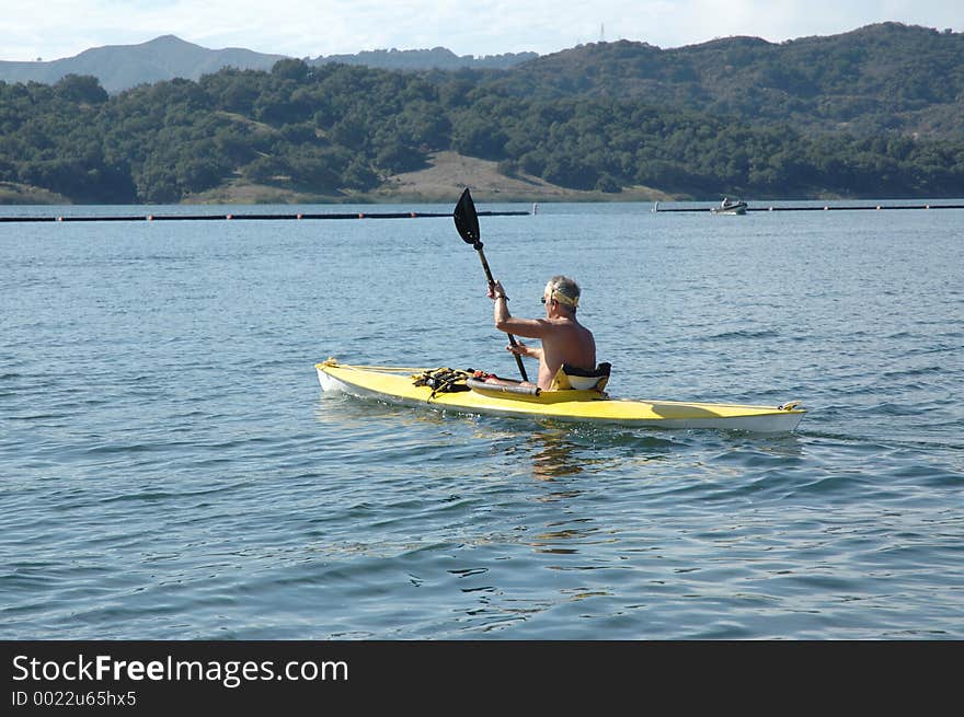 Man on kayak on the lake. Man on kayak on the lake