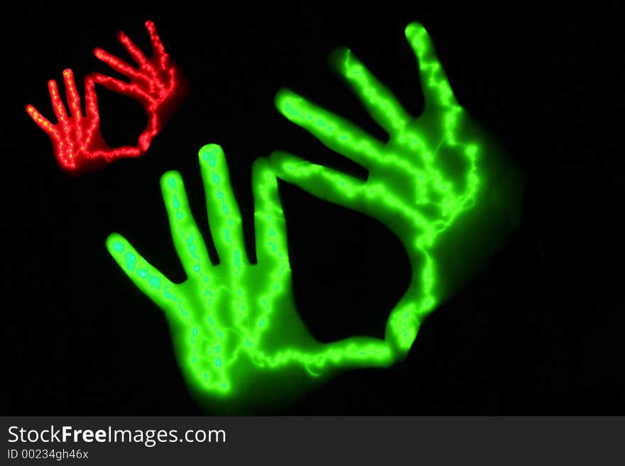 Couple of glowing hands. Couple of glowing hands