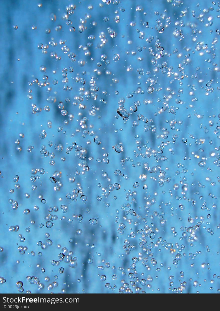 Water drops on blue bakground. Water drops on blue bakground