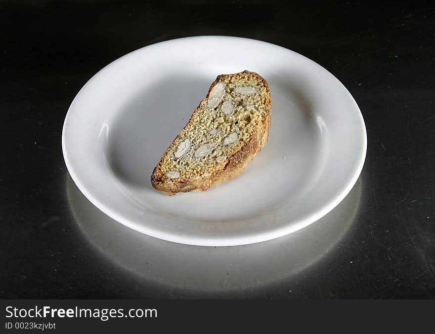 Biscotti on a plate on an aluminum table