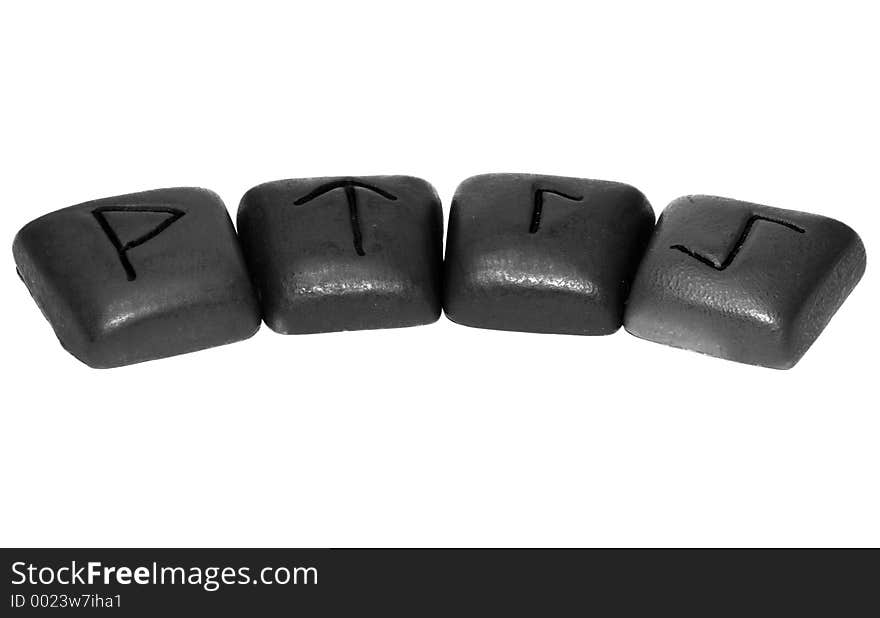 4 runes in black and white shot on white background. 4 runes in black and white shot on white background