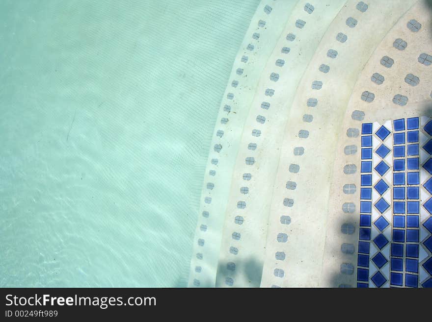 Beautiful tiling at the edge of this outdoor pool in Africa. Beautiful tiling at the edge of this outdoor pool in Africa