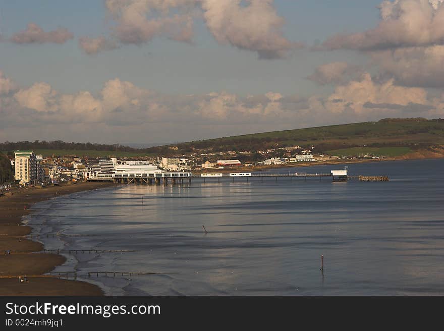 Seascape with seaside pier and other buildings. Seascape with seaside pier and other buildings