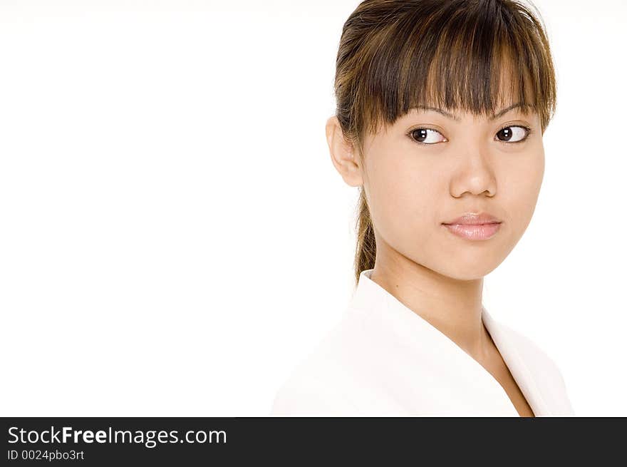 A very attractive young female in white on white. A very attractive young female in white on white