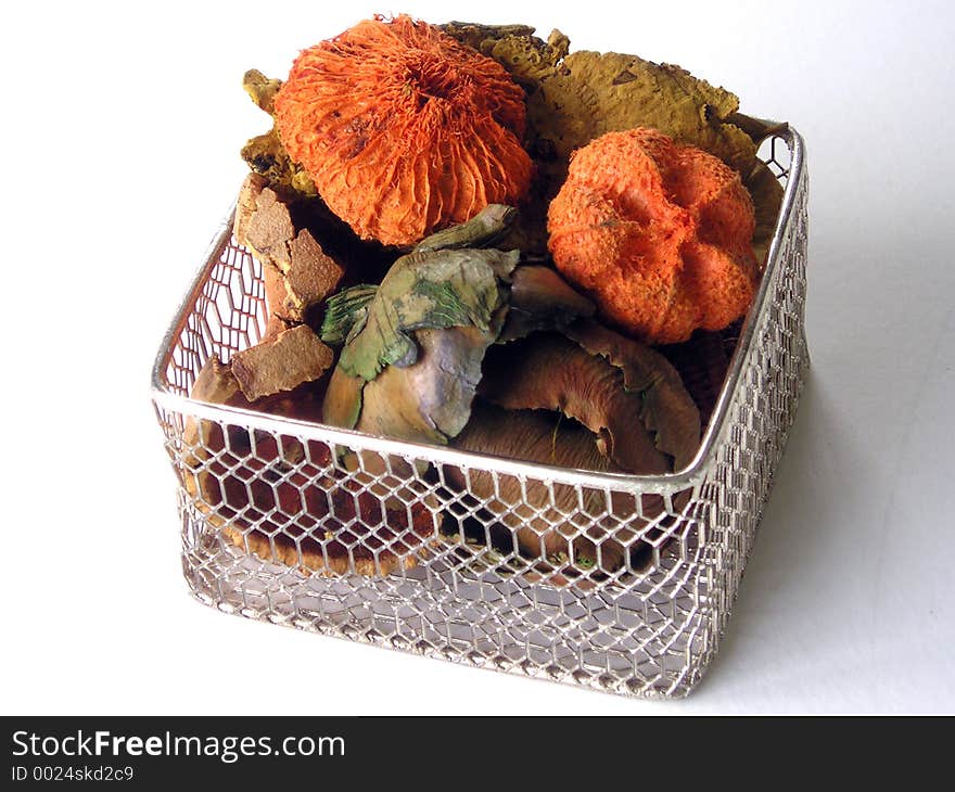 Colorful autumn potpourri in a basket.