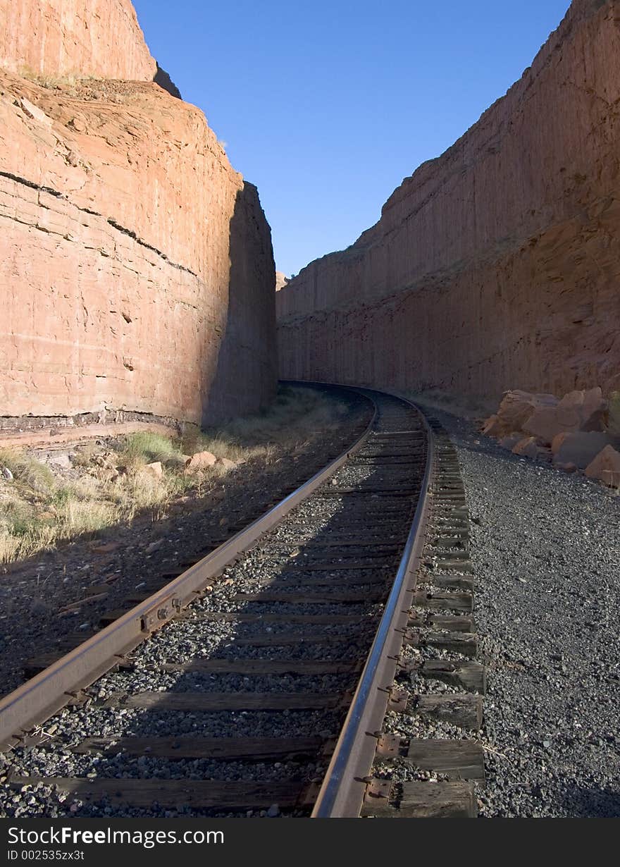 An unsympathetic landscape yields to the railroad near Moab, Utah. An unsympathetic landscape yields to the railroad near Moab, Utah