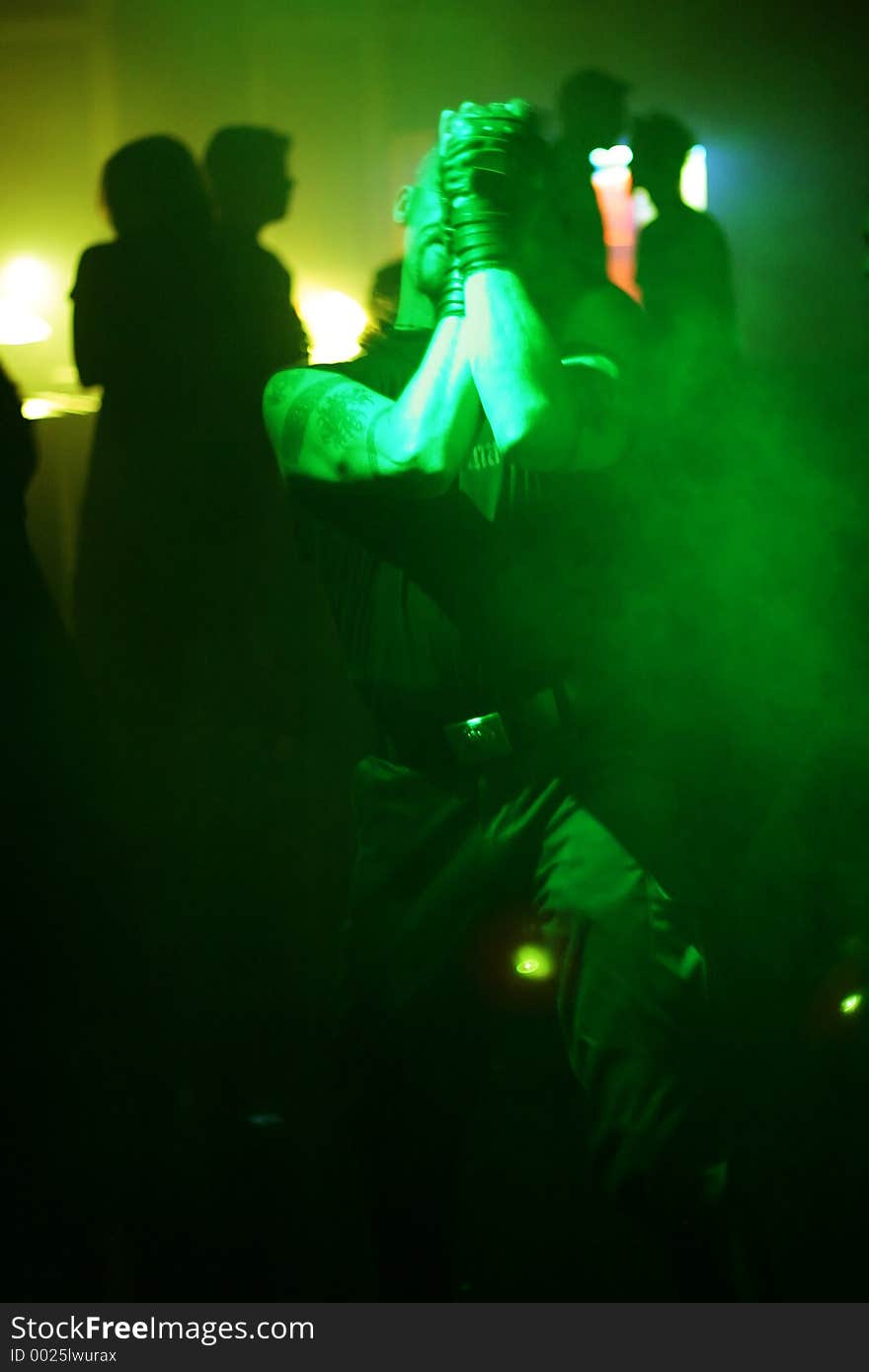 Dancing young man in an underground club. Dancing young man in an underground club