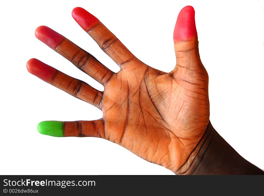 This is an image of a black hand with a green and red finger tips. This is an image of a black hand with a green and red finger tips.