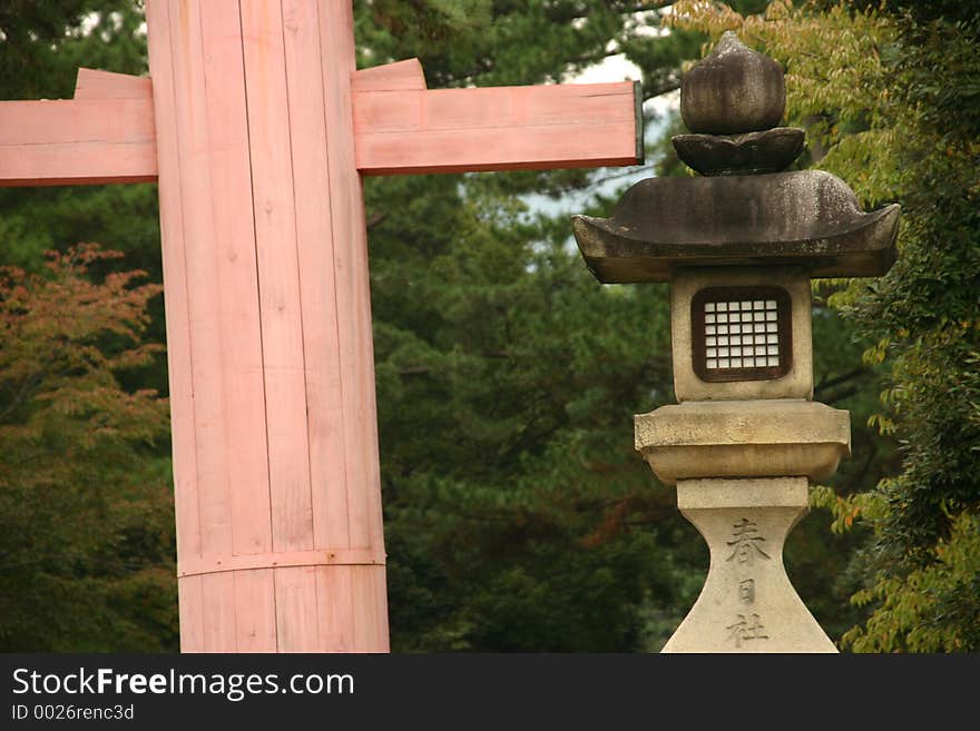 Details of a pillar and a lantern in a japanese garden. Details of a pillar and a lantern in a japanese garden