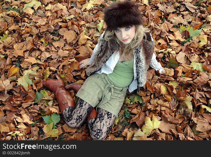 Fashion Model on fallen leaves. Fashion Model on fallen leaves