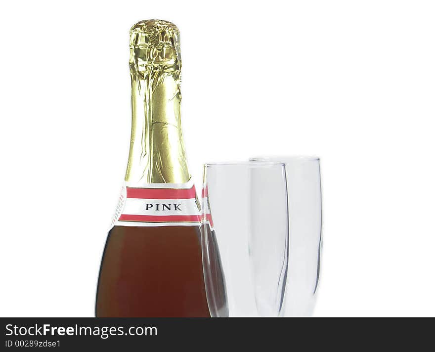 Champagne bottle with two champagne flutes isolated on white. Champagne bottle with two champagne flutes isolated on white.