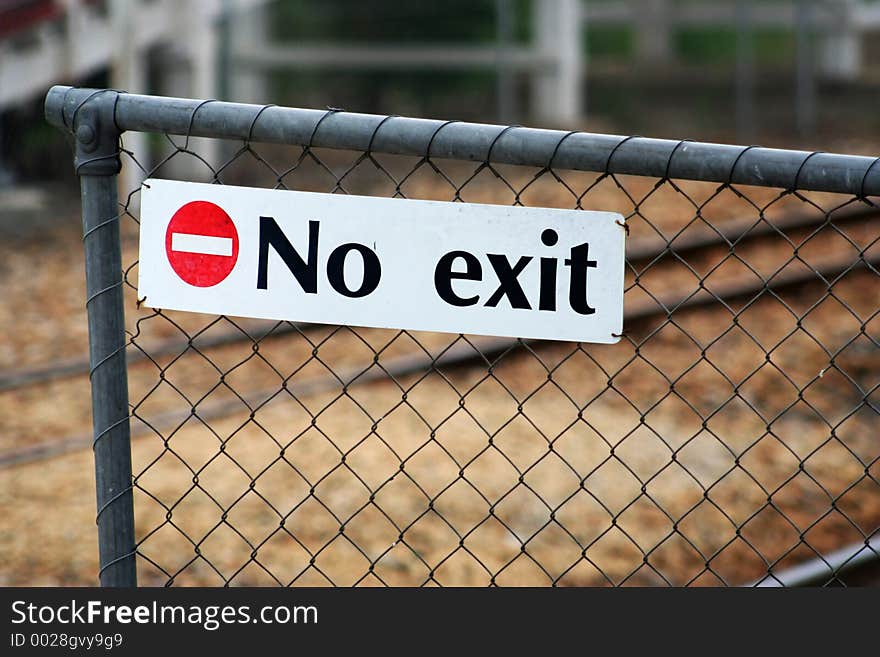 No exit sign by the side of a railway track